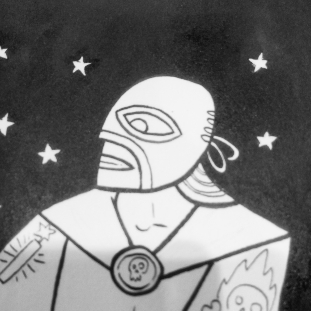 black and white photo of an ink drawing of a mexican wrestler